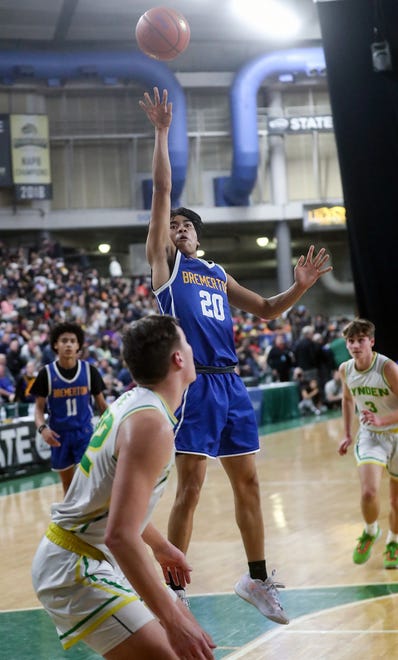 Bremerton’s Isaiah Cadengo (20) takes a shot against Lynden in the 2A boys basketball state semifinals in Yakima on Friday, March 1, 2024.
