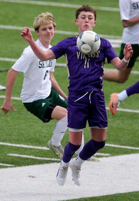 North Kitsap’s Ethan Peck (11) chest traps the ball during their season opener against Skyline in Poulsbo on Saturday, March 9, 2024.