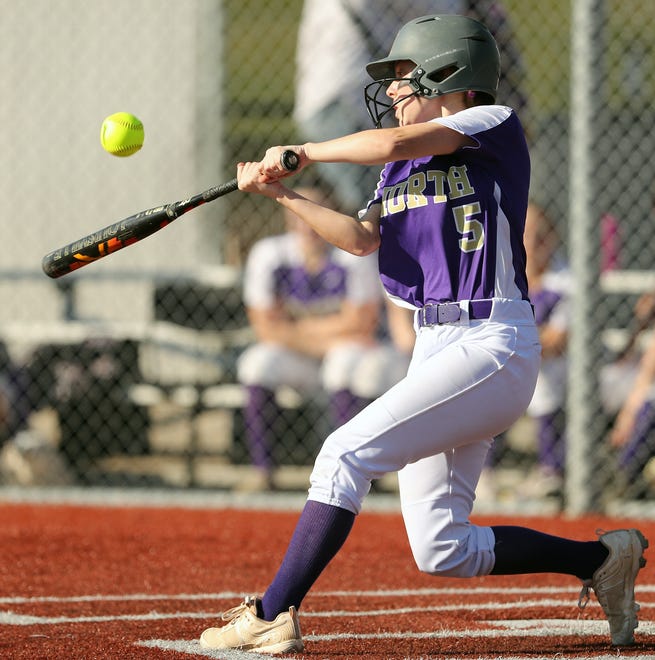 North Kitsap’s Reyna Blackwood connects with pitch against Olympic at Lobe Fields on Tuesday, March 19, 2024.