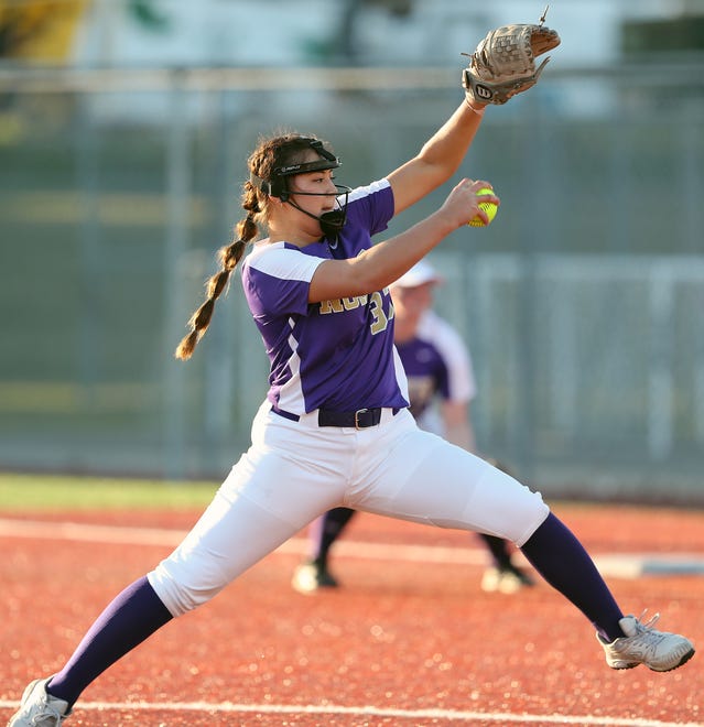 North Kitsap’s Cerenity Fake (33) pitches against Olympic at Lobe Fields on Tuesday, March 19, 2024.
