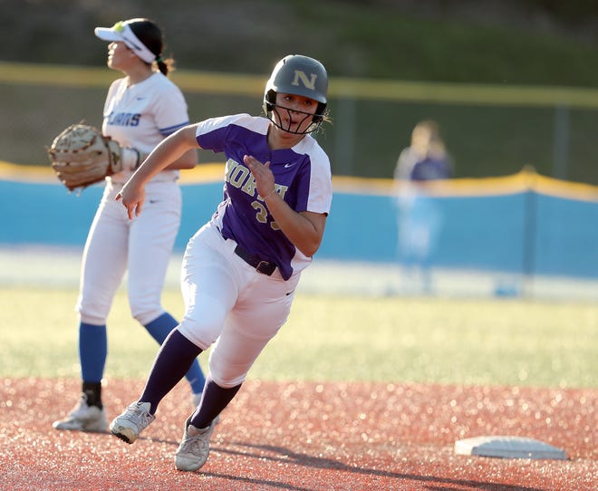 North Kitsap’s Cerenity Fake (33) rounds second base against Olympic at Lobe Fields on Tuesday, March 19, 2024.