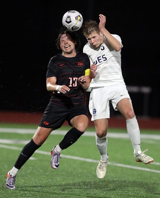 Central Kitsap’s Nicholas Strickland (13) and Gig Harbor’s Ethan Schuette (5) go up for a header during their game in Silverdale on Thursday, March 21, 2024. Central Kitsap won the game 2-1.